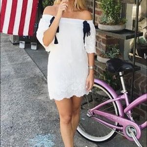 Off shoulder white eyelet mini dress
